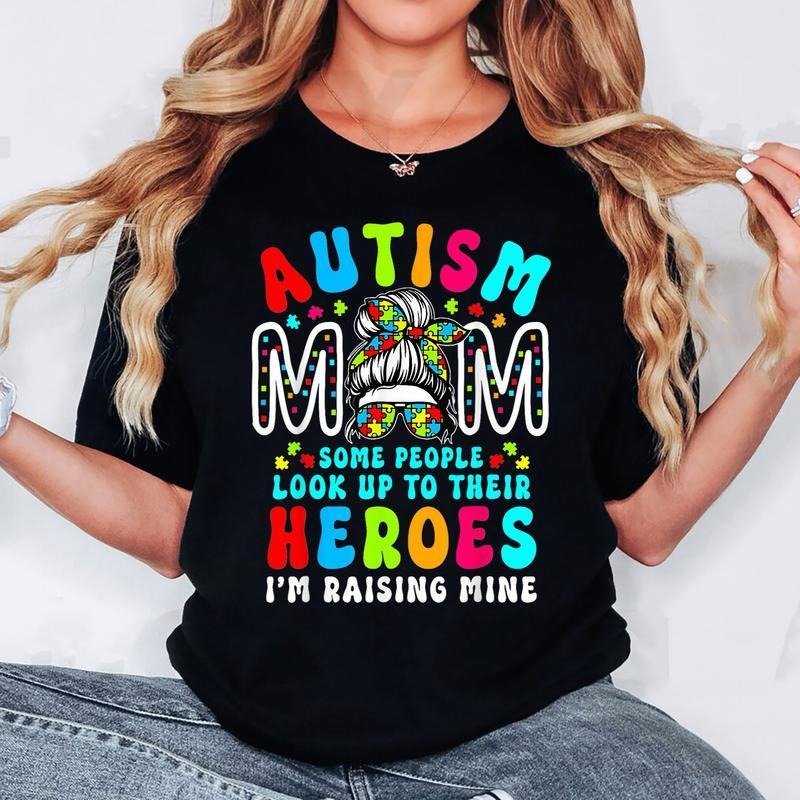 [100% Cotton] Autism Mom Raising Hero Groovy Messy Bun Autism Awareness T-Shirt Hoodie, Sweatshirt | HypeCrazeTee.com
