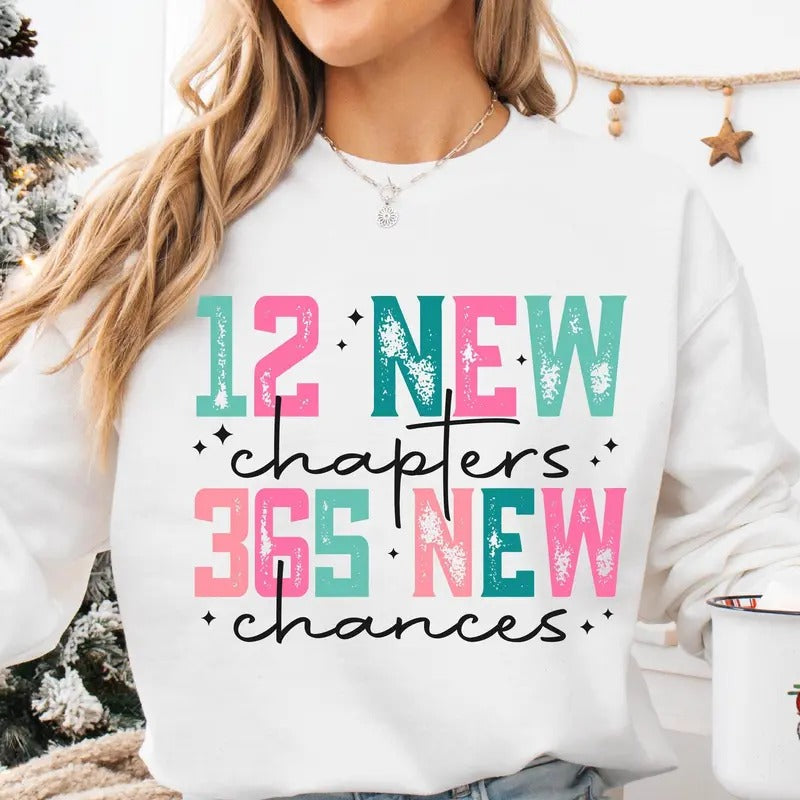 12 New Chapters 365 New Chances Sweater, Happy New Year 2025, Neww Years Shirt Hoodie, Sweatshirt | HypeCrazeTee.com