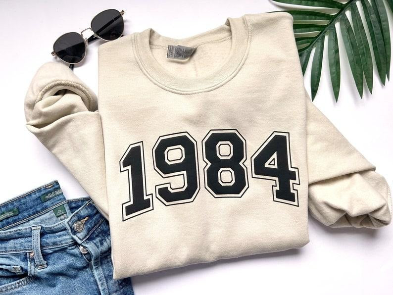 1984 Year sweatshirt, birthday sweatshirt, birth year Hoodie and Sweater; T-shirt Cotton Menswear | HypeCrazeTee.com