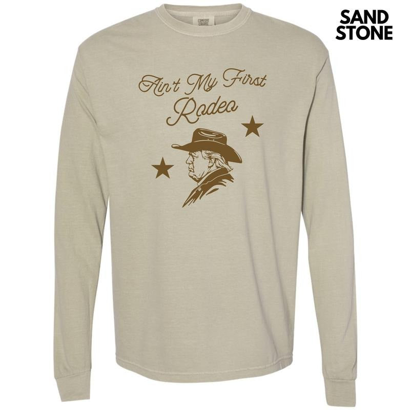 Ain't My First Rodeo Long Sleeve Comfort Colors T-Shirt 'NLB' Hoodie, Sweatshirt | HypeCrazeTee.com