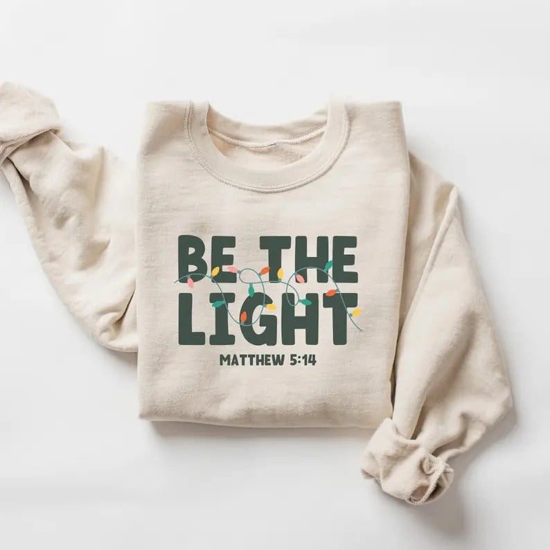 Be The Light Sweatshirt, Religious Christmas Sweatshirt, Christian Holiday Sweater, Faith Based Gift, Christmas Gifted,...