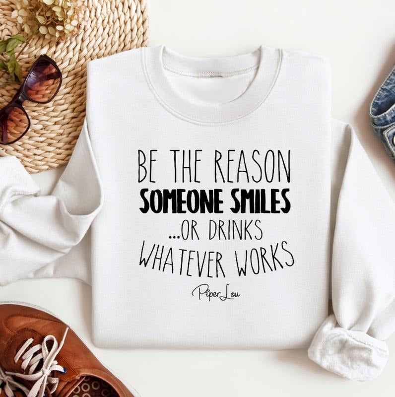 Be The Reason Someone Smiles Sweatshirt Classic Womenswear T-Shirts, Hoodie | HypeCrazeTee.com
