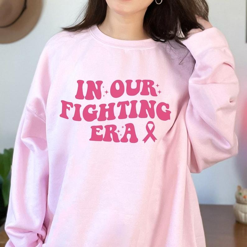 Breast Cancer Support Shirt, Cancer Awareness Shirt, In Our Fighting Era Sweatshirt, Breast Cancer Shirt, Fighter Tee,...