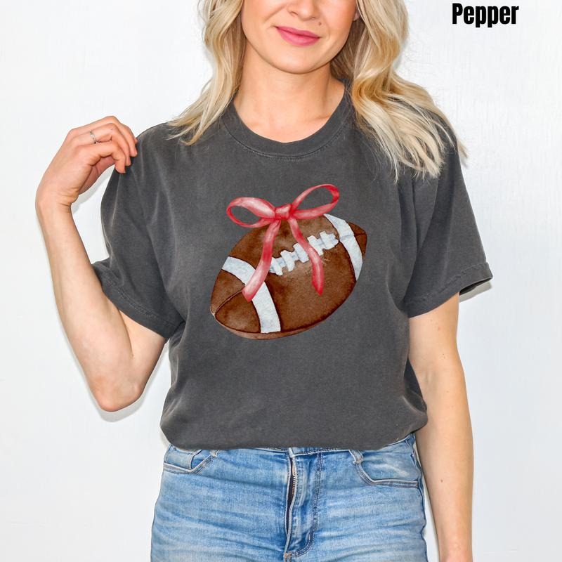 *CUSTOMIZABLE* Bow & Football Comfort Colors T-Shirt 'NLB' Hoodie, Sweatshirt | HypeCrazeTee.com