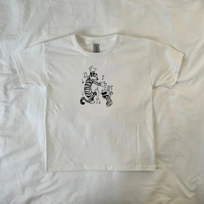 Calvin and Hobbes baby tee, Vintage-Style Cartoon T-Shirt, streetwear clothing, Pinterest, retro, comic duo, 90s style...