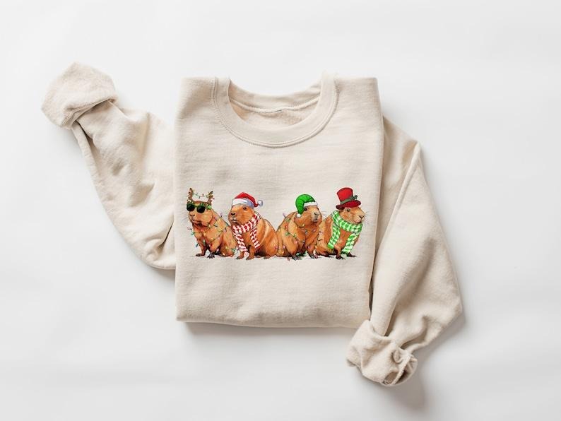 Capybara Merry Christmas Sweatshirt, Capybara Santa Xmas Lights Sweater, Capybara Lover Gift, Christmas Animals Shirt,...