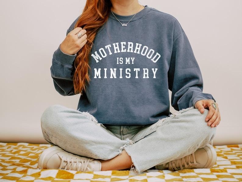 Christian Motherhood Is My Ministry Christian Her ; Cotton Polyester Womenswear Light Solid Tops T-Shirts, Hoodie, Sweatshirt
