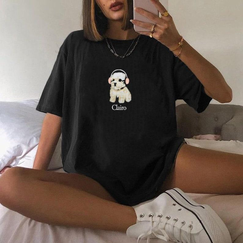 Clairo Dog Pup Headphones Listening to Music Funny Shirt Hoodie, Sweatshirt | HypeCrazeTee.com