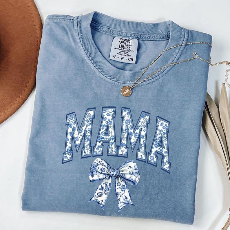 Comfort Colors Coquette Bow Mama T-Shirt, Coquette Blue Bow Shirt, Mother's Day Gift Hoodie, Sweatshirt | HypeCrazeTee.com