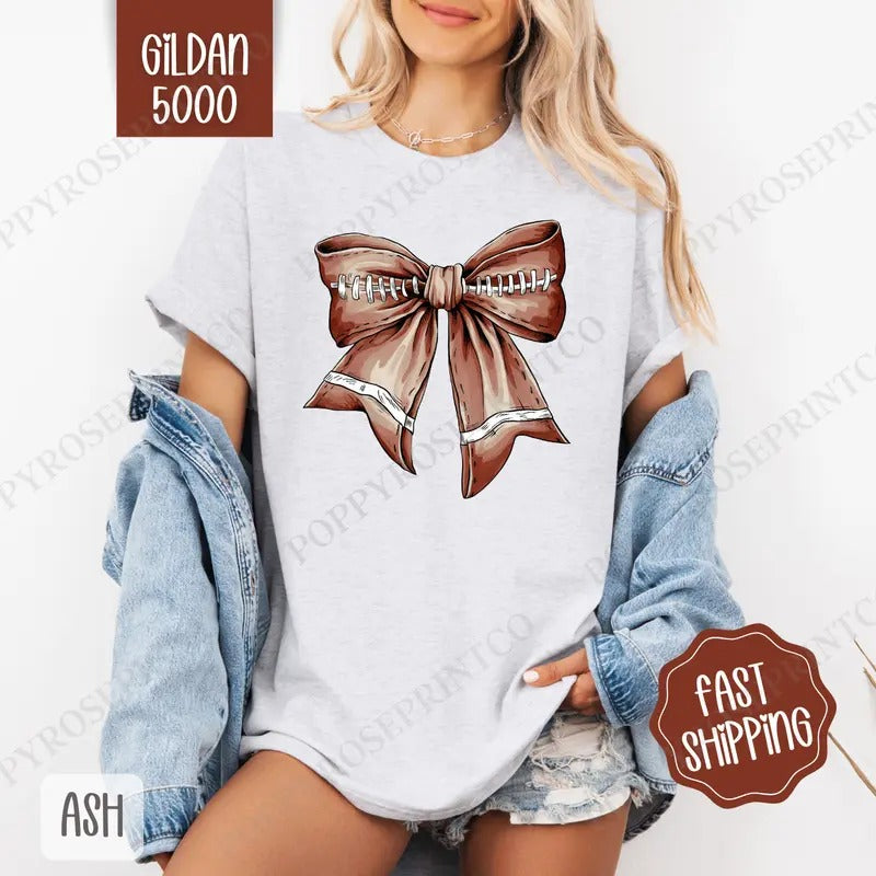 Coquette Football Bow Shirt Gildan, Trendy Women's Tee, Cute Women's Tshirt Plus Sizes Hoodie, Sweatshirt | HypeCrazeTee.com