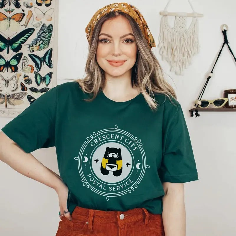 Crescent City Postal Service T-Shirt, Otter Messenger Sweatshirt, Sarah J Maas Tharion Mer House of Earth and Blood Sky...