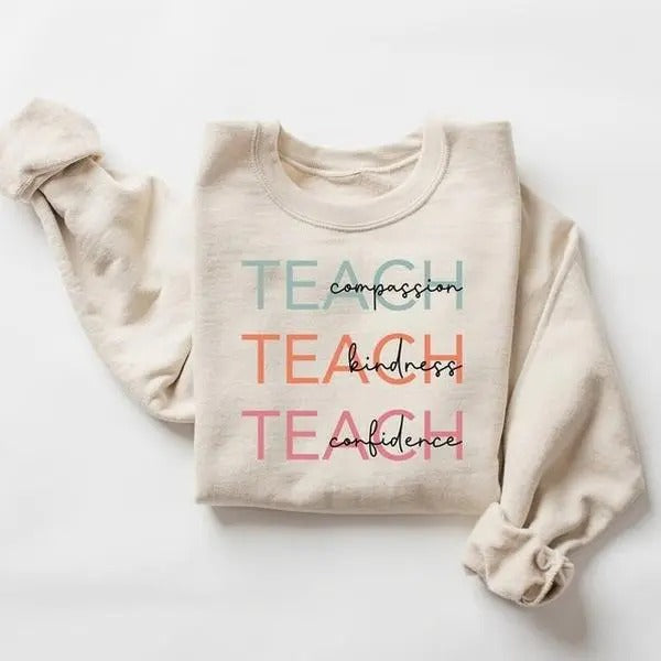 Cute Teach Compassion Kindness Confidence Teacher Long Sleeve Round Neck Casual New Teachers T-Shirts, Hoodie, Sweatshirt
