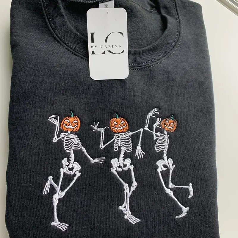Dancing Skeletons Embroidered Sweatshirt | Halloween Skeleton Shirt | Cozy Fall Sweatshirt | Spooky Season Apparel | Fun...