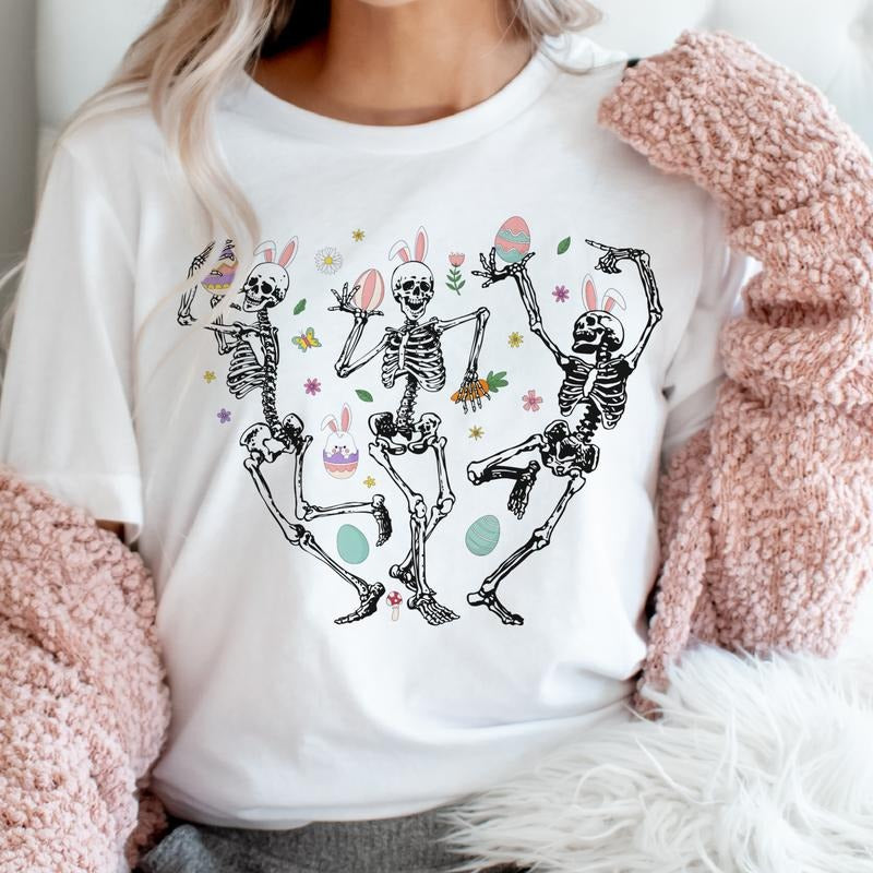 Easter Skeleton Graphic Tee Dancing Skeleton Easter Bunny Ears Tshirt Easter Eggs Skull T-Shirts Unisex Womens Easter...