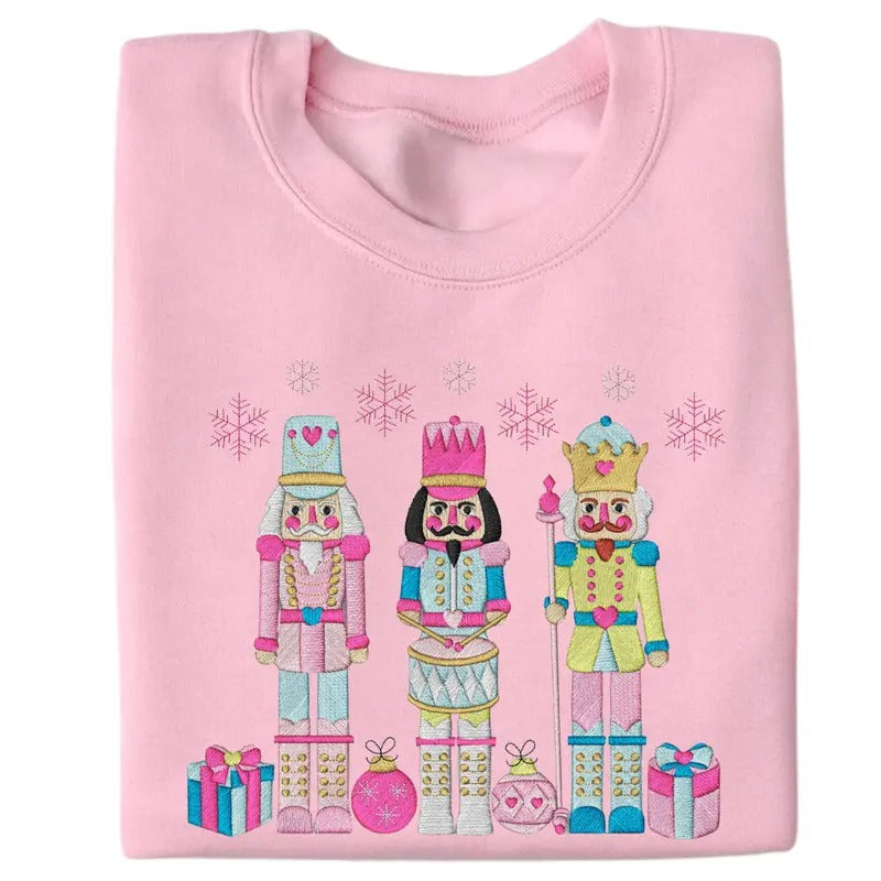 Festive Trio Embroidered Nutcracker Christmas Womenswear Crewneck Pullover Sweatshirt T-Shirts, Hoodie | HypeCrazeTee.com