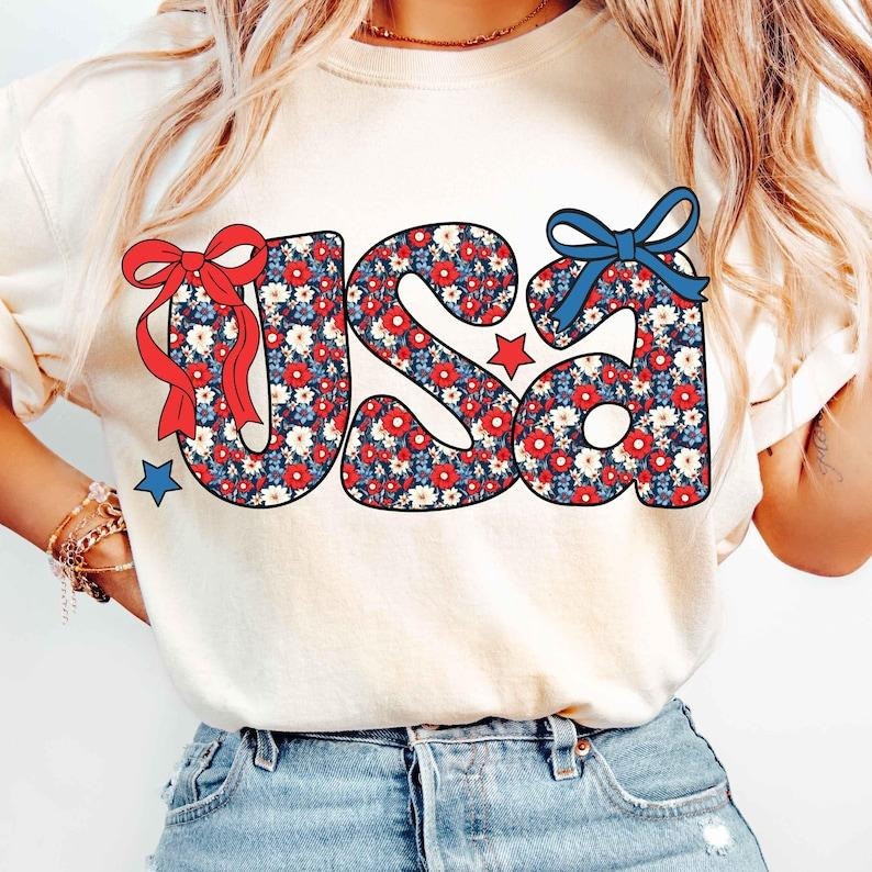 Floral Coquette Bow USA 4th Of July Retro America Floral USA Coquette Independence Day America Coquette Bow T-Shirt...