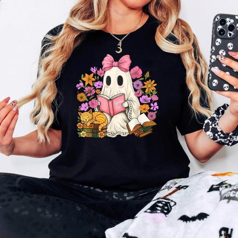 Floral Coquette Ghost Reading Book Spooky Halloween Teacher T-Shirt, Casual Short Sleeve T-Shirt Soft Cotton, Perfect Fit...