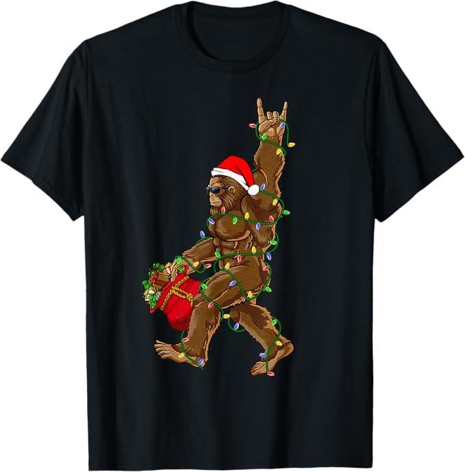Funny Christmas Shirt, Christmas Gift, Santa Bigfoot Christmas Lights Rock Funny Sasquatch Believe T-Shirt
