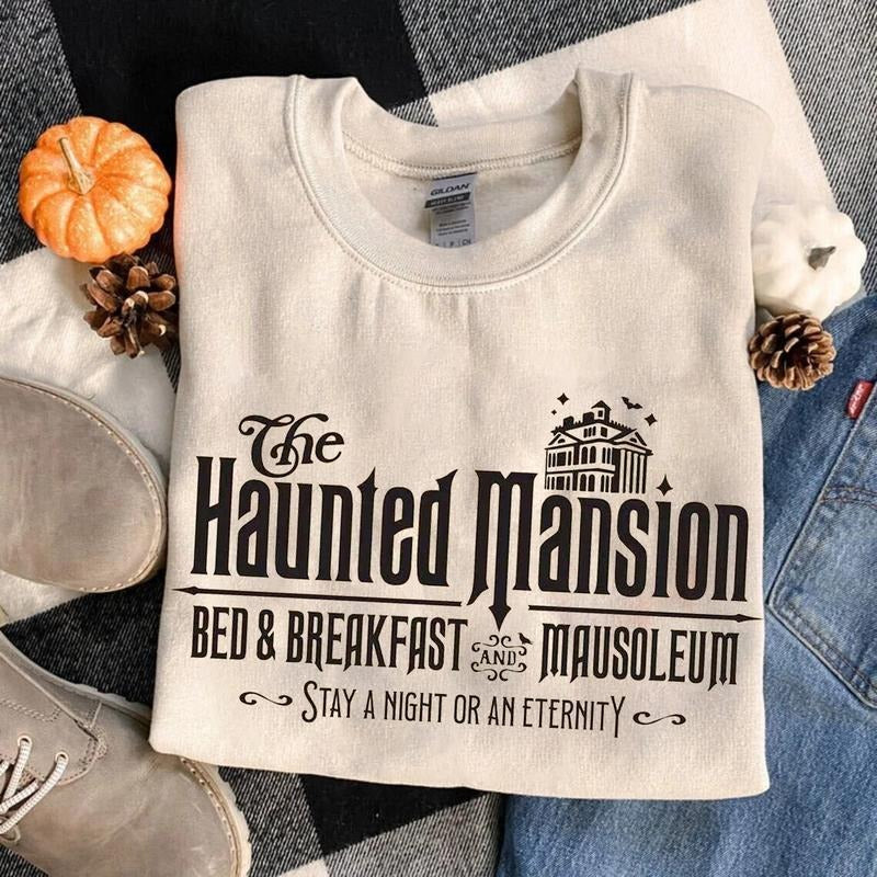 Haunted Mansion Hitchhiking Ghosts Madame Leota Welcome  Foolish Mortals Sweatshirt T-Shirts, Hoodie | HypeCrazeTee.com