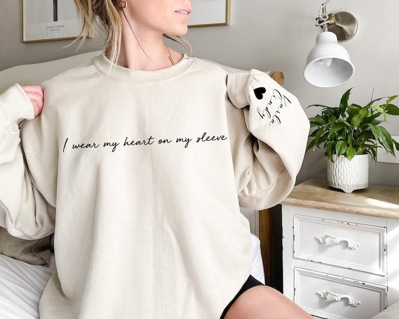 I Wear My Heart On My Sleeve Sweatshirt and Hoodie, Gift for Mom, Custom Mama Sweatshirt with Children Name on Sleeve,...
