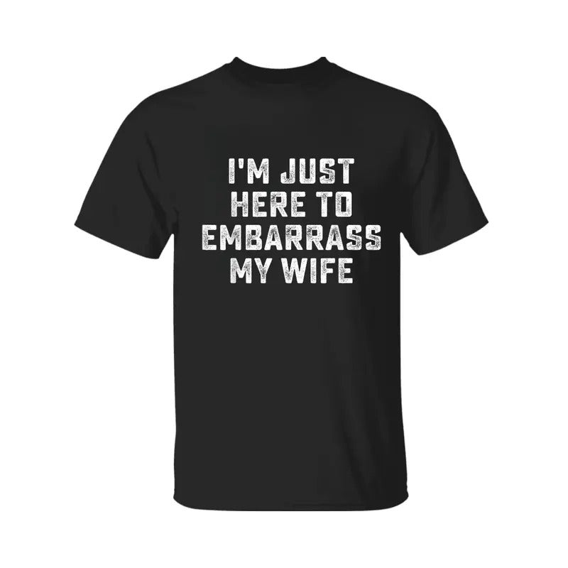 I'm Just Here To Embarrass My Wife Shirt, Funny Husband T-Shirt, Men's Cross Graphic Tee, 2025 Casual Summer Outfit, For...