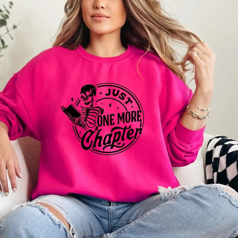 JUST ONE MORE CHAPTER SKELETON READING BOOK Crewneck Sweatshirt T-Shirts, Hoodie | HypeCrazeTee.com