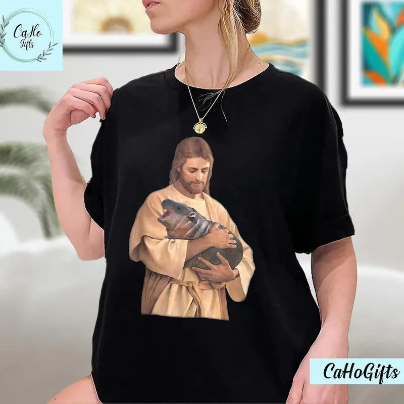 Jesus Moo Deng Shirt, Jesus Loves Moo Deng Bouncy Pig Cute Baby Hippo Meme T-Shirt, Moo Deng Shirt, Sweatshirt, Hoodie