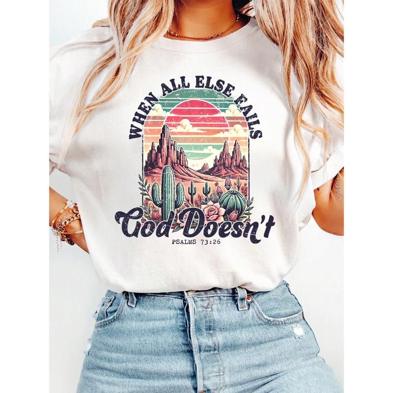 Ladies' T - Shirt: Find Spiritual Comfort with 'When All Else Fails God Doesn't' Design, Featuring a Stunning Desert...