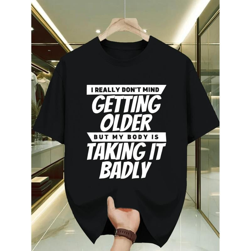 Men's Funny Slogan T-Shirt "I Really Don't Mind Getting Older But My Body Is Taking It Badly" - Black with White Print,...