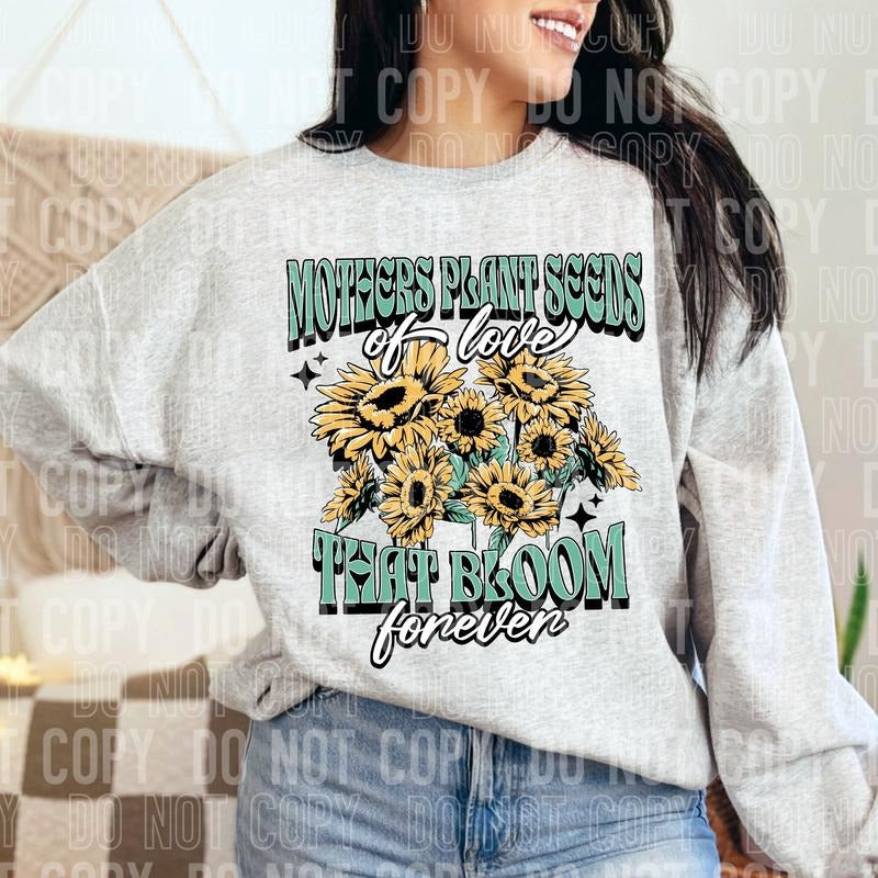 Mothers Plant Seeds DTF Transfers - THIS IS NOT A SHIRT Hoodie, Sweatshirt | HypeCrazeTee.com