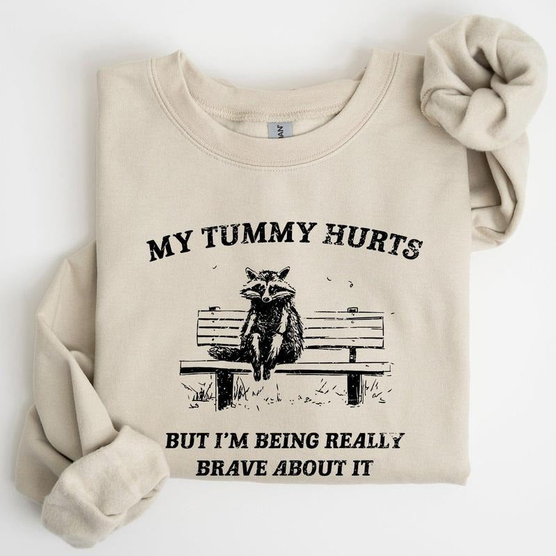 My Tummy Hurts, Raccoon, Meme, Aesthetic, Funny Sweatshirt, Women's Crew Neck, Crewneck T-Shirts, Hoodie | HypeCrazeTee.com