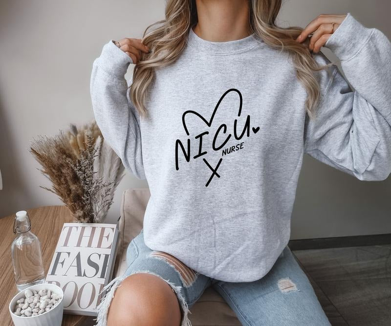 NICU Nurse with a heart Crewneck Sweatshirt T-Shirts, Hoodie | HypeCrazeTee.com