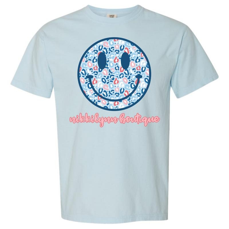 NLB Merch - Blue Patriotic Cheetah Happy Face Comfort Colors T-Shirt Hoodie, Sweatshirt | HypeCrazeTee.com