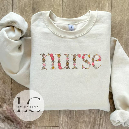 "Nurse" Floral Embroidered Sweatshirt - Stylish Medical Apparel - Custom Floral Design - Cozy Healthcare Jumper T-Shirts,...