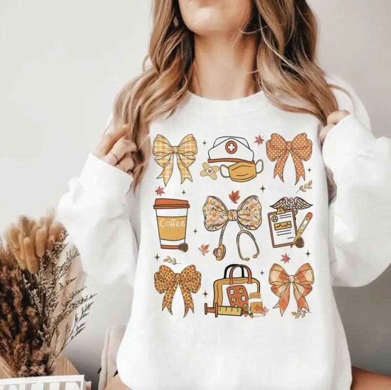 Nurse Fall Coquette Autumn Pumpkin Preppy Nursing Shirt Cute Bow Coquette Nurse Cozy Fall Nurse T-Shirts, Hoodie, Sweatshirt