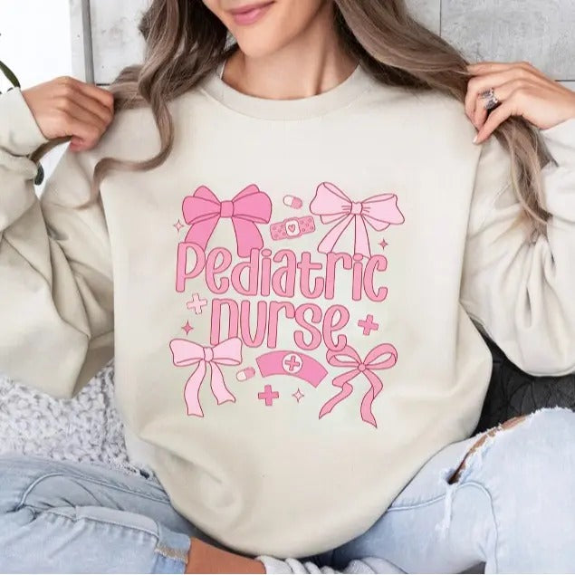 Pediatric Nurse Coquette Nurse Peds Nurse Pediatric Shirt Bow Shirt Shirt Comfort Cotton T-Shirts, Hoodie, Sweatshirt
