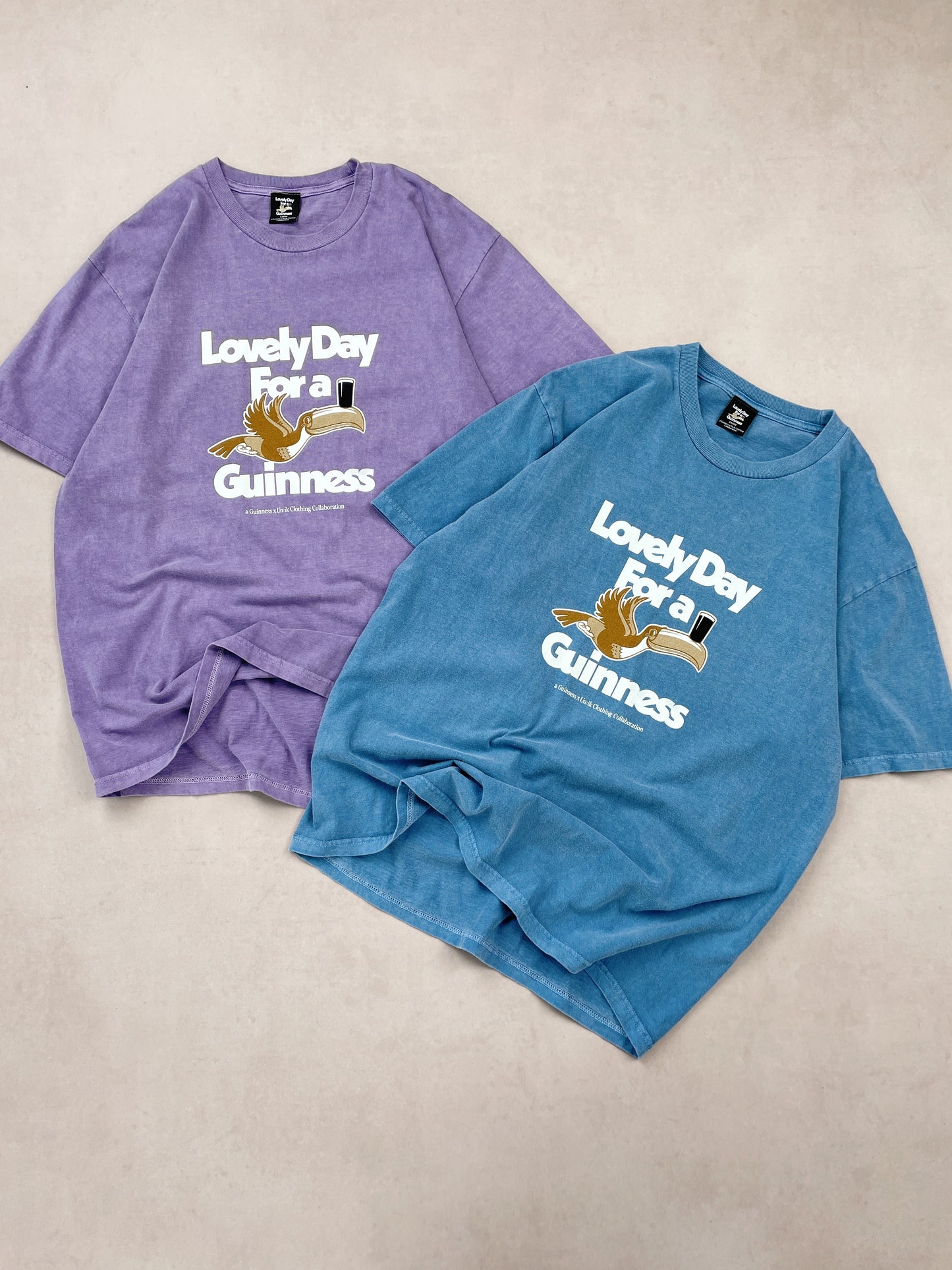 Guinness x UN:IK 'Lovely Day' Vintage Washed Tee Twinpack - Blue/Purple