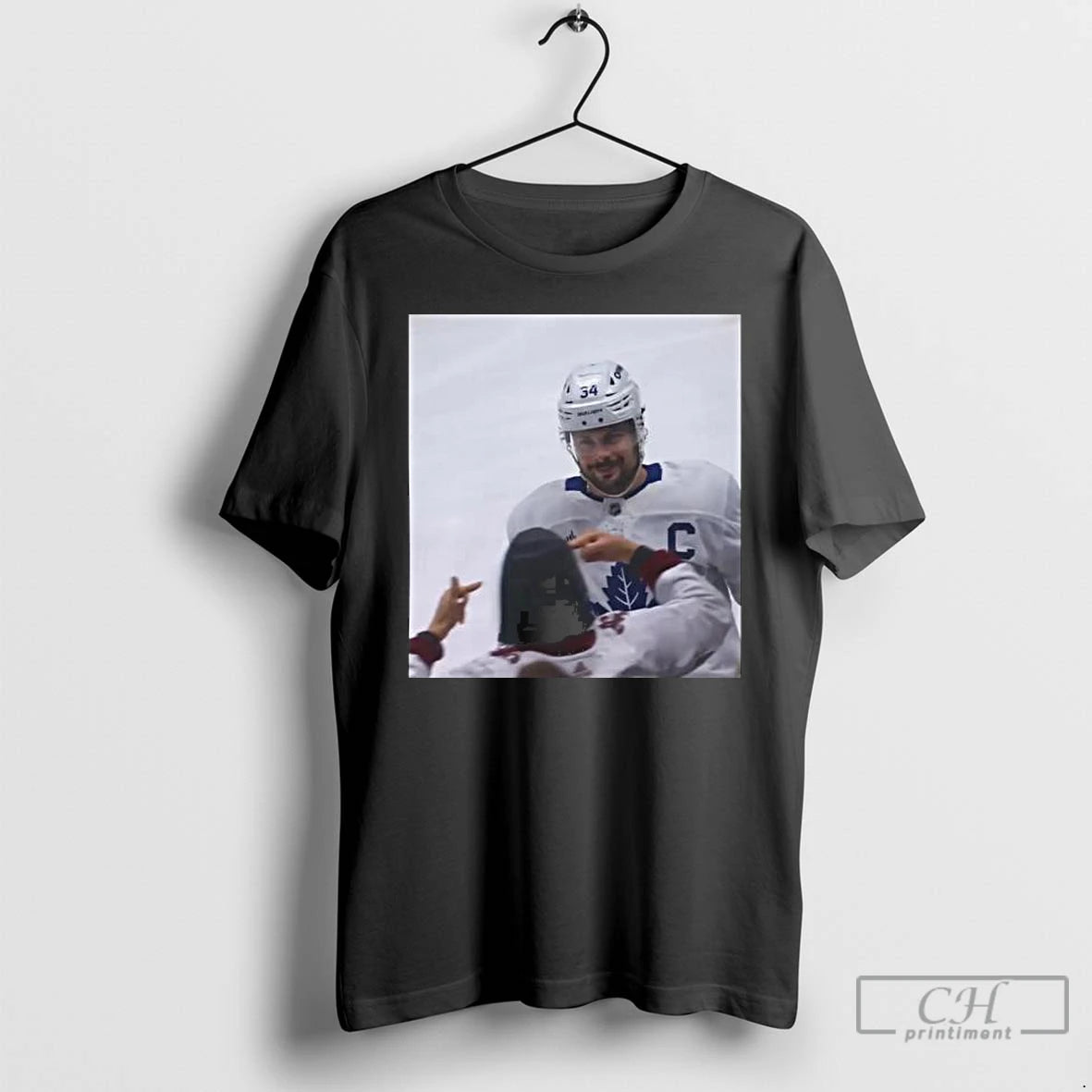 Premium Auston Matthews Smirks At The Avs Fans T-Shirts, Hoodie, Sweatshirt | HypeCrazeTee.com
