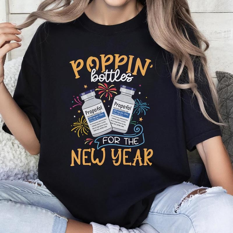 Sandjest Nurse T-Shirt Poppin' Bottles for the New Year Gift for Women Girl Friend Hoodie, Sweatshirt | HypeCrazeTee.com