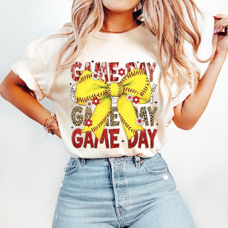 Softball Coquette, Game Day  Retro Softball Bow Mom,  Mama Shirt, Tis the Season Tshirt Hoodie, Sweatshirt | HypeCrazeTee.com