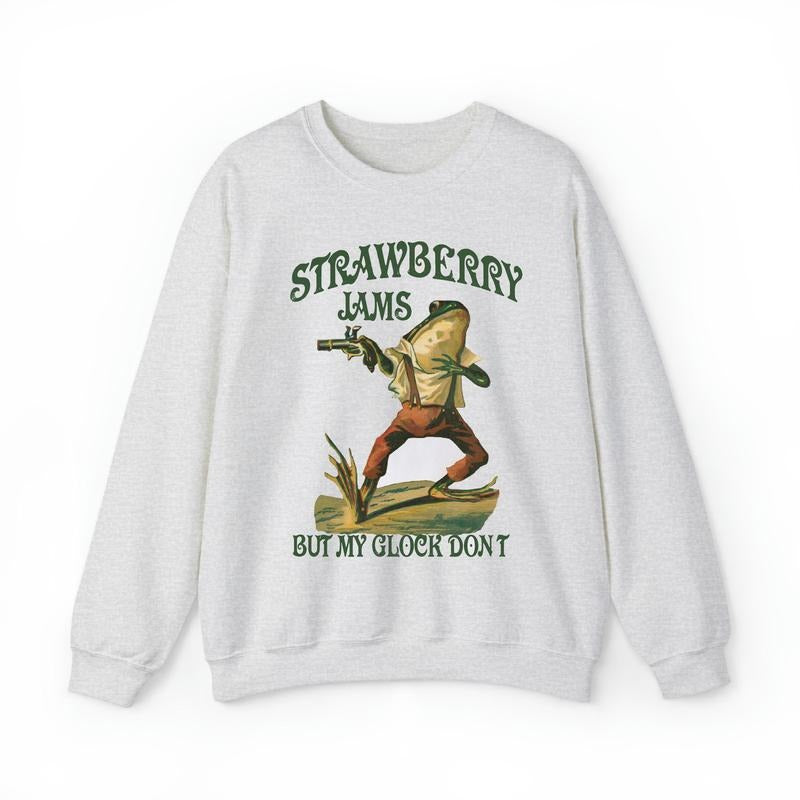 Strawberry Jams But My Glock Don't Sweatshirt, Funny Frog Shirt, Funny Meme Crewneck Hoodie | HypeCrazeTee.com