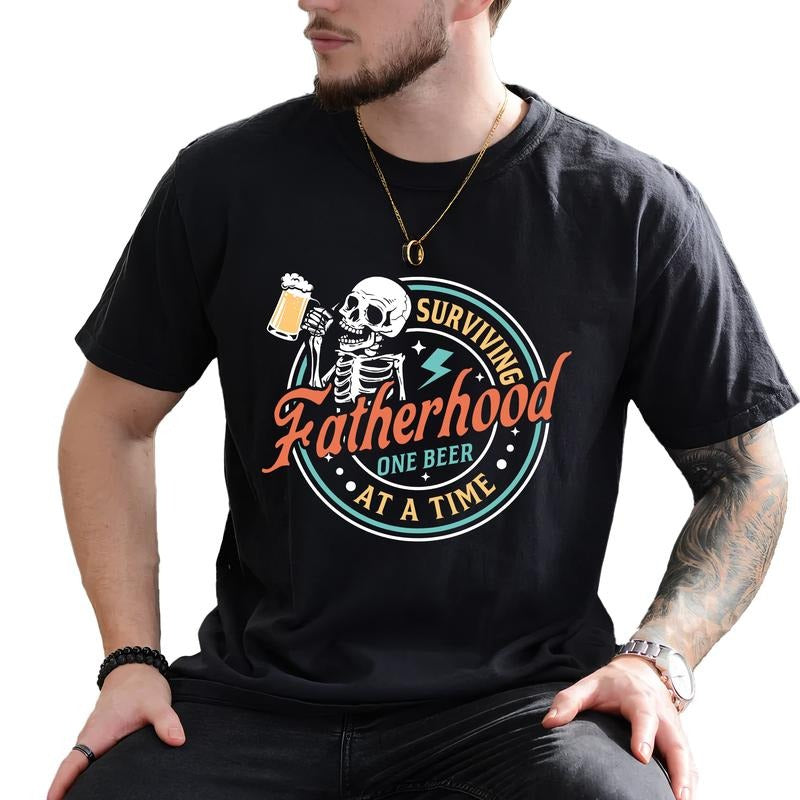 Surviving Fatherhood One Beer At A Time Shirt, Fatherhood Tee, Funny Father Graphic Printed Tee, Sarcastic Drinking...