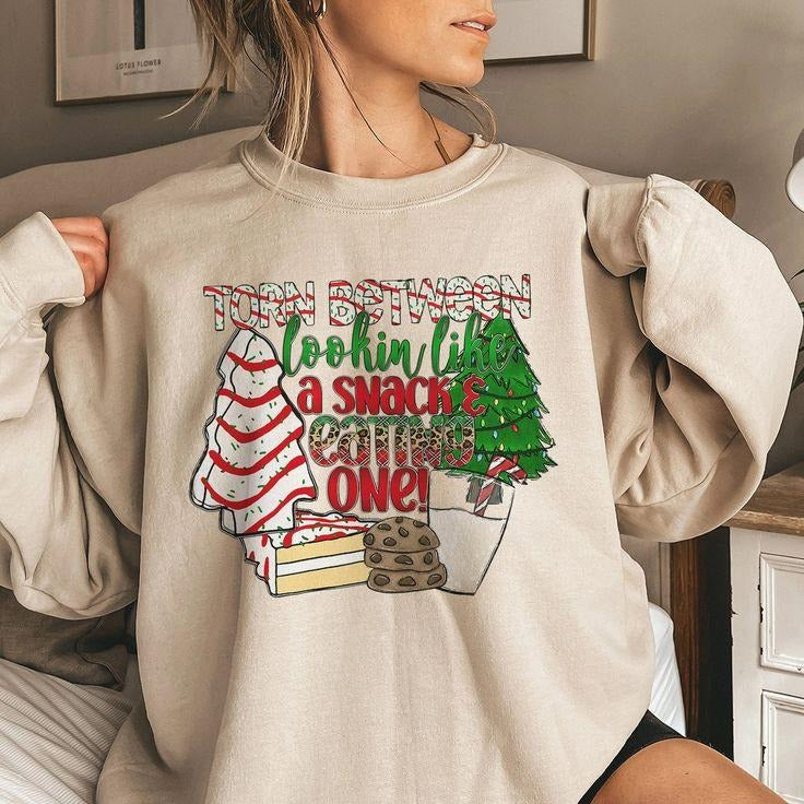 Torn Between Lookin Like a Snack and Eatin One Sweatshirt, Christmas Sweatshirt For Women, Christmas Tree Cake Lover...