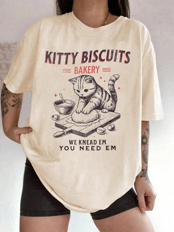 Unisex "Kitty Biscuits Bakery" Graphic T-Shirt with "We Knead Em You Need Em" Slogan, Cute Cat Baking Theme Cotton Tee...