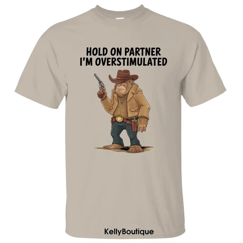 Western Cowboy Bigfoot Sasquatch Hold On Partner I'm Overstimulated Shirt, Gift for Dad, Father's Day Gift Unisex Cotton...