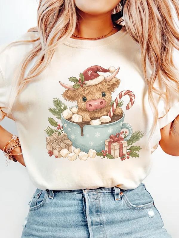 Women's Beige 'Christmas Highland Cow in Hot Chocolate' Graphic Short Sleeve T-Shirt - Cute Festive Holiday Tee, Ideal...