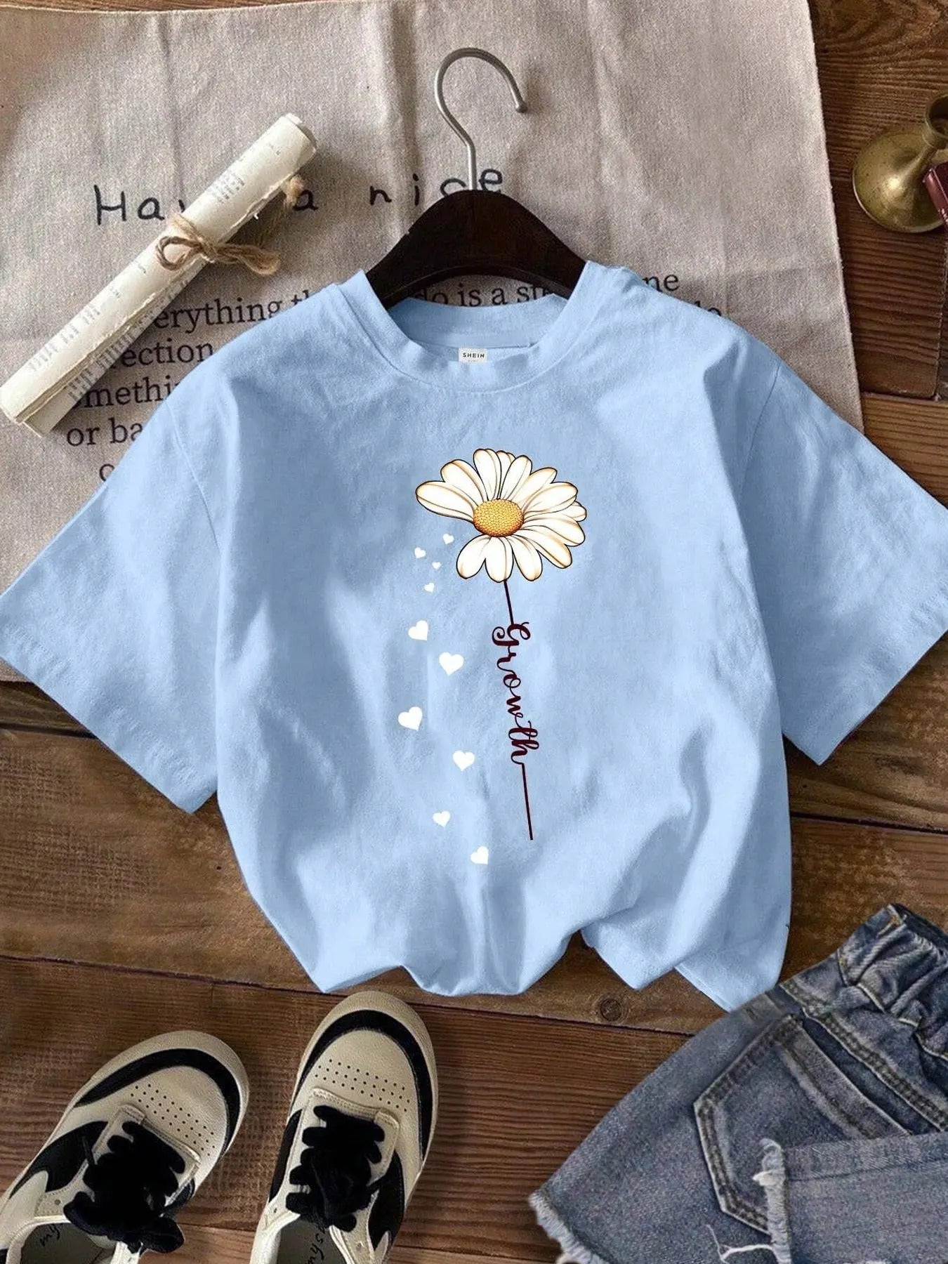 Women's Daisy & Letter Print Round Neck Tee, Fashion Casual Crew Neck Short Sleeve T-shirt for Daily Holiday Vacation...