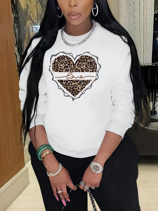 Women's Leopard Heart Print Contrast Sequin Pullover Sweatshirt, Casual Long Sleeve Round Neck Sweatshirt for Fall &...