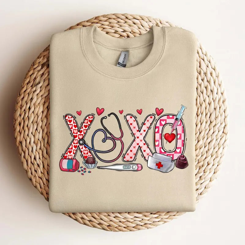 XOXO Nurse Sweatshirt - Valentines Day Shirt for Nurses - Unisex Cotton T-shirt - Fabric Hoodie | HypeCrazeTee.com