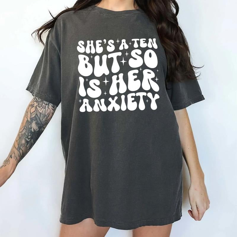 She'S Ten But So Is Her Anxiety Wavy Text Shirt Funny Quote Unhinged Sarcasm Anxiety Awareness T-Shirts, Hoodie, Sweatshirt